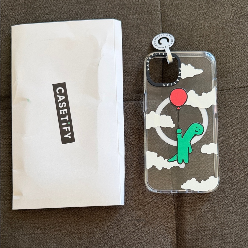 Casetify Clear Phone Case with Green Dinosaur and Red Balloon